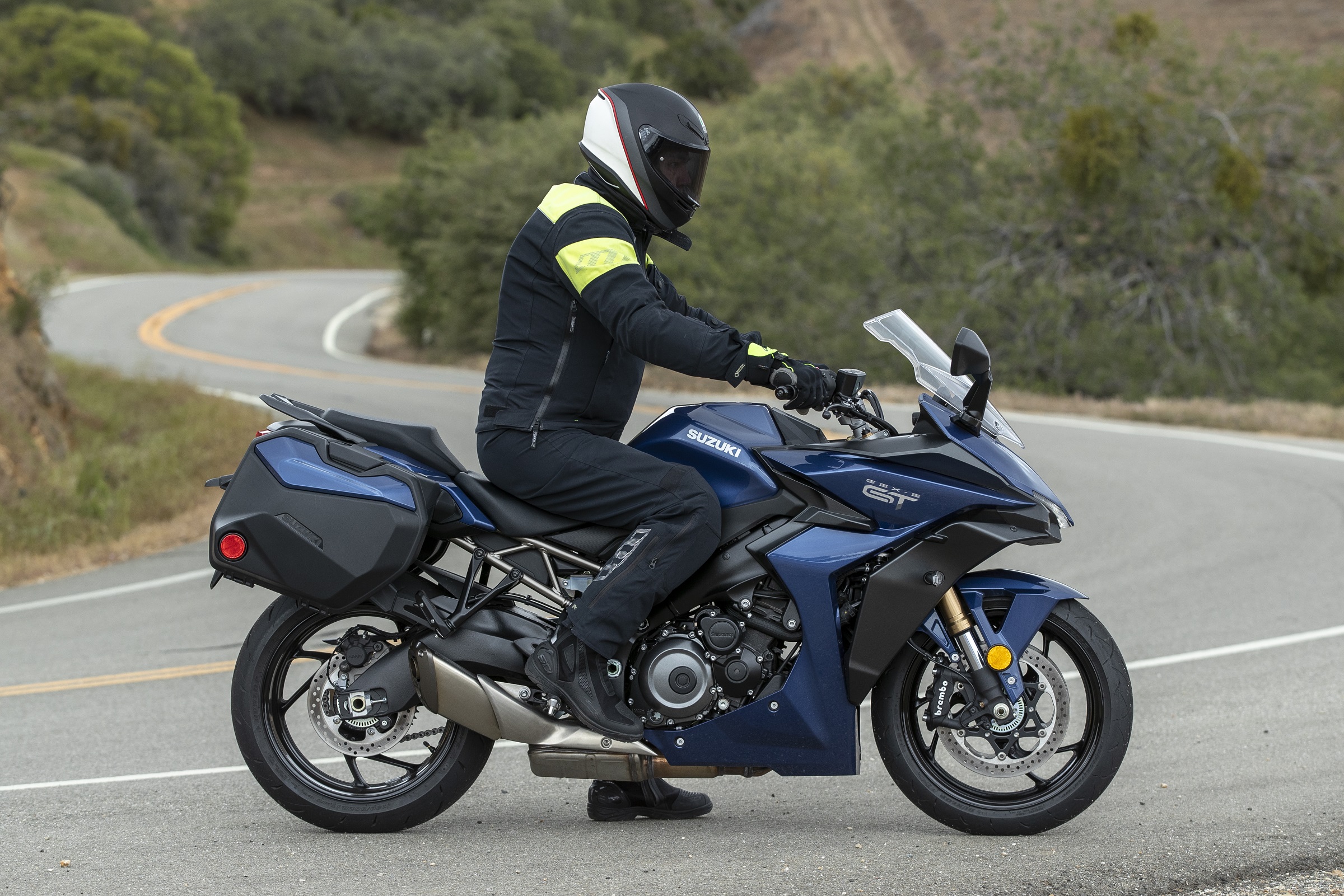 rider sitting on the Suzuki GSX-S1000GT+ to show the ergonomics