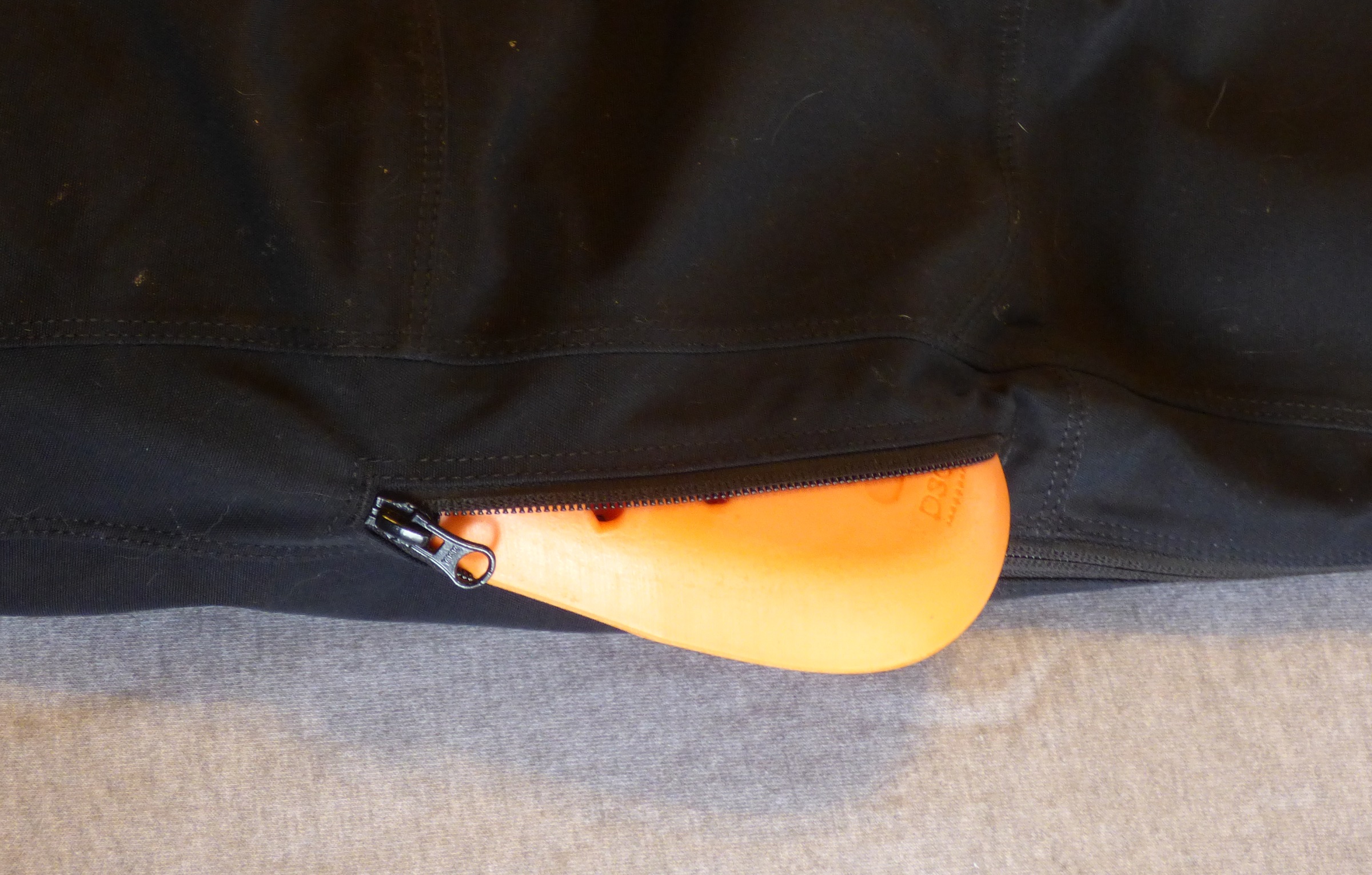 zipper access to knee armor